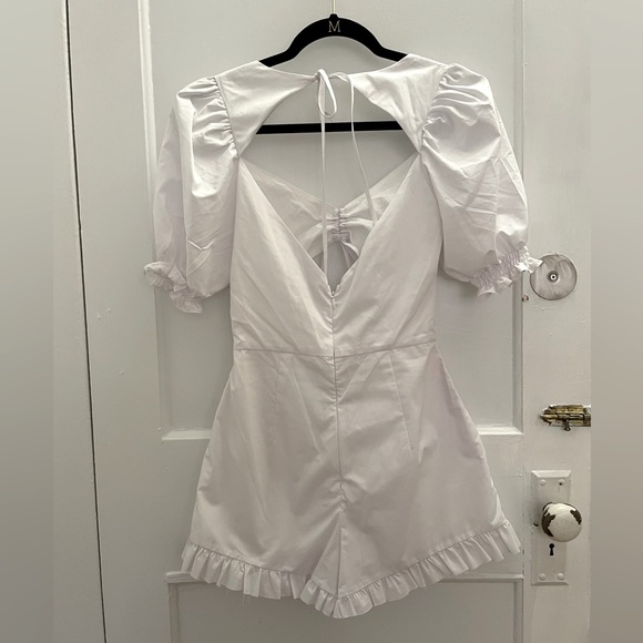 For Love and Lemons white cutout romper with puff sleeves. Size small. - Picture 4 of 5